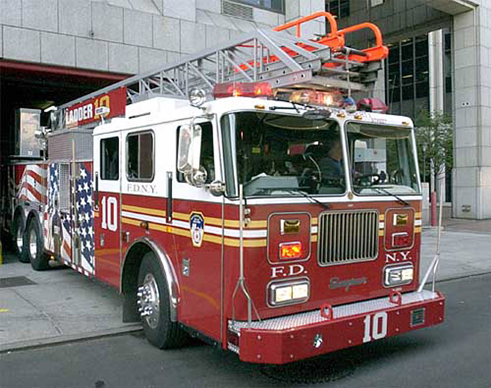 Ladder 10 aerial truck: Ladder 10 is a rear-mount aerial fire truck designed by Seagrave Fire Apparatus to FDNY specifications. It costs about $550,000.  Photo by Mike De Sisti © 2002 Appleton Post-Crescent