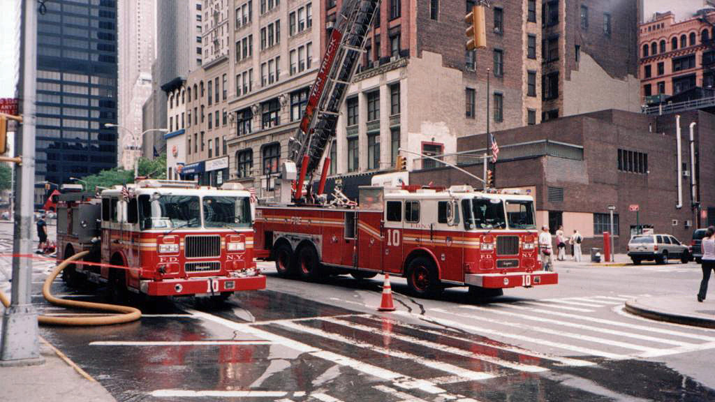 Thanks to Antoine from France for this photo of Engine 10 and Ladder 10 taken 6/27/2001 on Liberty Street. The Ten House is to the right partially hidden by the cab of Ladder 10.