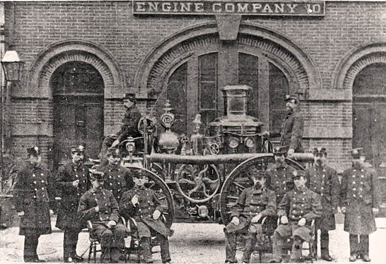 Steamer & members in front of quarters. Photo FDNY George F. Mand Library