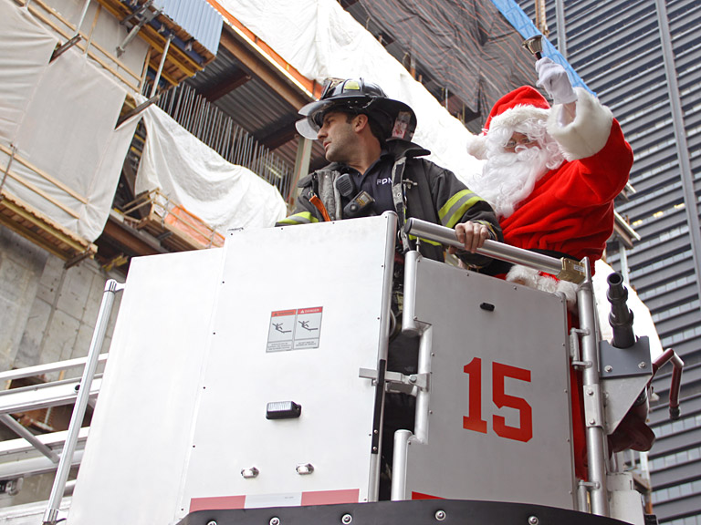 Santa being rescued by Ladder 15