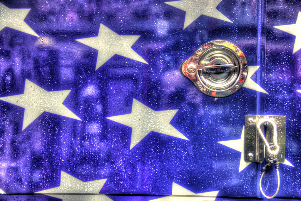 Drops of rain shine on this HDR Photo of the Ten Truck Flag Mural